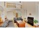 Inviting living room with fireplace, staircase, and comfortable seating area at 3245 Bywater Trl, Roswell, GA 30075