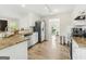 Bright, spacious kitchen featuring granite countertops, stainless steel appliances, and light wood flooring at 942 Marta Crane Dr, Lawrenceville, GA 30045
