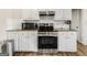 Well-equipped kitchen featuring stainless steel appliances, modern cabinets, and granite countertops at 942 Marta Crane Dr, Lawrenceville, GA 30045
