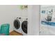 This laundry area features modern appliances and ample workspace, perfect for multitasking at 942 Marta Crane Dr, Lawrenceville, GA 30045