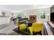 Bright living room with fireplace, comfortable seating, and natural light at 942 Marta Crane Dr, Lawrenceville, GA 30045