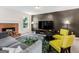 Living room featuring fireplace, television, and comfortable seating at 942 Marta Crane Dr, Lawrenceville, GA 30045