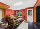 Bright living room with cozy seating, natural light and stylish flooring at 942 Marta Crane Dr, Lawrenceville, GA 30045