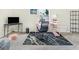 Bright home office with colorful decor and a well-designed workspace for productivity at 942 Marta Crane Dr, Lawrenceville, GA 30045