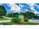 Stratford Green community sign surrounded by lush greenery and mature trees at 3150 Stratford Green Pl, Avondale Estates, GA 30002
