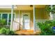 Close-up of the front porch with white railings and view of the home's address at 3150 Stratford Green Pl, Avondale Estates, GA 30002