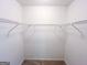 Large walk-in closet with ample shelving for optimal storage and organization at 3150 Stratford Green Pl, Avondale Estates, GA 30002