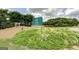 Well maintained Studio entrance sign surrounded by lush greenery and vibrant ground cover at 185 Discovery Lake Dr, Fayetteville, GA 30215