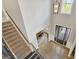 Entryway with hardwood floors, stairs, and a view to the formal dining room at 185 Discovery Lake Dr, Fayetteville, GA 30215