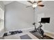 Spacious room featuring an exercise bike, ample lighting, and space for fitness activities at 185 Discovery Lake Dr, Fayetteville, GA 30215