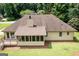 Aerial shot of the home's backyard and screened-in porch at 280 Ridgemont Dr, Fayetteville, GA 30215