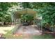 Carport structure with a trailer stored inside at 280 Ridgemont Dr, Fayetteville, GA 30215
