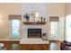 Close up of the fireplace with mantle and brick surround at 280 Ridgemont Dr, Fayetteville, GA 30215