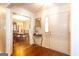 Welcoming foyer with hardwood floors, coat closet and dining room views at 280 Ridgemont Dr, Fayetteville, GA 30215