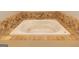 Close-up of a jacuzzi tub with beautiful tile surround at 280 Ridgemont Dr, Fayetteville, GA 30215