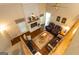 Living room showcases a brick fireplace, leather furniture, hardwood floors, and a ceiling fan at 280 Ridgemont Dr, Fayetteville, GA 30215