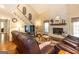 Inviting living room with staircase, fireplace, and comfortable seating at 280 Ridgemont Dr, Fayetteville, GA 30215