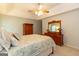 This main bedroom features dressers and a large bed with stylish bedding at 280 Ridgemont Dr, Fayetteville, GA 30215