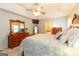 This main bedroom features dressers and a large bed with stylish bedding at 280 Ridgemont Dr, Fayetteville, GA 30215