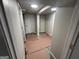 Spacious basement area with new flooring and fresh paint, ready for customization at 7128 Lady Heidi Ct, Jonesboro, GA 30236