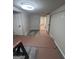 View of the finished basement with new flooring, showing the potential for living space at 7128 Lady Heidi Ct, Jonesboro, GA 30236