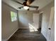 Bedroom with new luxury vinyl plank floors and a ceiling fan at 7128 Lady Heidi Ct, Jonesboro, GA 30236