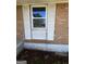 Close up of brick wall and white shutters outside the home at 7128 Lady Heidi Ct, Jonesboro, GA 30236