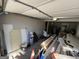 Unfinished garage space with supplies and room for customization at 7128 Lady Heidi Ct, Jonesboro, GA 30236