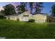 Beautiful backyard with green grass and trees, providing a serene outdoor space at 2944 Braithwood Ne Ct, Atlanta, GA 30345