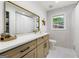 Bright bathroom featuring a modern vanity with ample counter space and hexagon tile floors at 2944 Braithwood Ne Ct, Atlanta, GA 30345