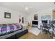 Bedroom featuring a bed, desk, shelves, television and a poster on the wall at 2944 Braithwood Ne Ct, Atlanta, GA 30345
