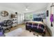 Bedroom featuring a bed, desk, and shelves, with a painting of whales on the wall at 2944 Braithwood Ne Ct, Atlanta, GA 30345