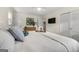 Relaxing bedroom with hardwood floors, natural light, closet space, and a comfortable king bed at 2944 Braithwood Ne Ct, Atlanta, GA 30345