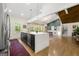 Kitchen with island, stainless steel appliances, and open concept layout adjacent to the dining area at 2944 Braithwood Ne Ct, Atlanta, GA 30345