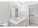 Upstairs bathroom features double sinks, lots of counter space, and bright lighting at 8750 Redford Ln, Suwanee, GA 30024