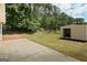 Storage shed in the backyard offering a solution for organizing and storing outdoor equipment at 501 Llewellyn Ct, Jenkinsburg, GA 30234