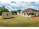 Large lot with a backyard shed and screened-in porch providing a peaceful outdoor retreat at 501 Llewellyn Ct, Jenkinsburg, GA 30234