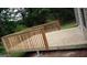 Backyard wooden deck with a railing at 756 Glenshire Ct, Riverdale, GA 30274