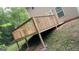 Backyard wooden deck with a railing at 756 Glenshire Ct, Riverdale, GA 30274