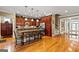 Gourmet kitchen with stainless steel appliances, custom cabinets, and a breakfast bar at 150 Campaign Trl, Fayetteville, GA 30214