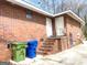 Brick home featuring an exterior entrance with access stairs at 857 Grant Se Ter, Atlanta, GA 30315