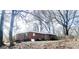 Brick home featuring an outdoor seating area in its backyard at 857 Grant Se Ter, Atlanta, GA 30315