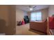 bedroom with neutral color scheme, carpeted floors, and a ceiling fan at 4613 Beau Point Ct, Snellville, GA 30039