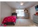 Cozy bedroom featuring carpet floors, a ceiling fan, and gray furnishings at 4613 Beau Point Ct, Snellville, GA 30039