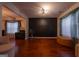 This home features hardwood floors and multiple windows that provide natural light to the spacious living room at 4613 Beau Point Ct, Snellville, GA 30039