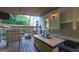 Inviting covered patio with ample seating and a built-in fire pit at 4613 Beau Point Ct, Snellville, GA 30039