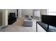 Bonus Room featuring comfortable seating, a whiteboard, and an entertainment center for relaxation and productivity at 145 Seawright Dr, Fayetteville, GA 30215