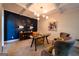 A modern office space showcasing contemporary lighting, desk, and comfortable seating at 145 Seawright Dr, Fayetteville, GA 30215