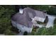 Overhead view of a well-maintained home, showing its roof, manicured landscaping, and driveway at 433 Abbey Springs Way, Mcdonough, GA 30253