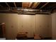 Unfinished basement space showcasing storage cabinets and exposed ceiling features at 433 Abbey Springs Way, Mcdonough, GA 30253